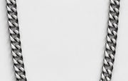 Close-up of satin steel curb chain links